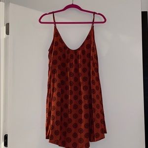 Mini red skater dress with black pattern